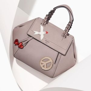 Tory Burch Half Moon Peace Dove